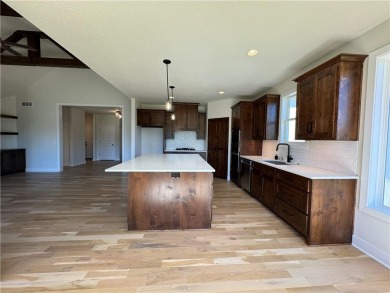 BEAUTIFUL MODEL NOW FOR SALE! WELCOME TO THE SORRENTO -REV 1 on Falcon Ridge Golf Course in Kansas - for sale on GolfHomes.com, golf home, golf lot