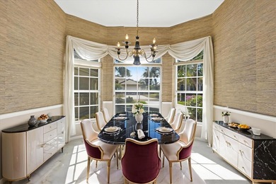 One or more photo(s) has been virtually staged. Located in the on University Park Country Club in Florida - for sale on GolfHomes.com, golf home, golf lot