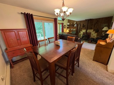 Enjoy four-season living in this inviting 2-bedroom, 1.5-bath on Hermitage Club Golf Course in Vermont - for sale on GolfHomes.com, golf home, golf lot