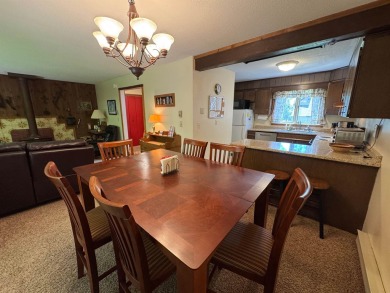 Enjoy four-season living in this inviting 2-bedroom, 1.5-bath on Hermitage Club Golf Course in Vermont - for sale on GolfHomes.com, golf home, golf lot