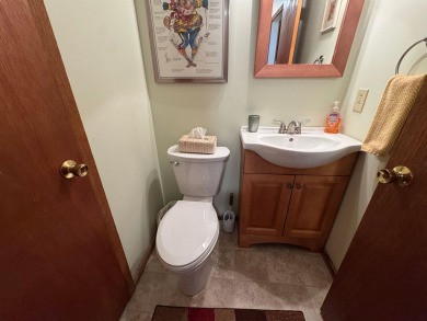 Enjoy four-season living in this inviting 2-bedroom, 1.5-bath on Hermitage Club Golf Course in Vermont - for sale on GolfHomes.com, golf home, golf lot