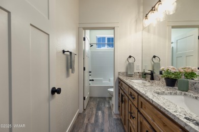 Welcome to this beautifully cared-for 4-bedroom, 2-bathroom home on Snowflake Municipal Golf Course in Arizona - for sale on GolfHomes.com, golf home, golf lot