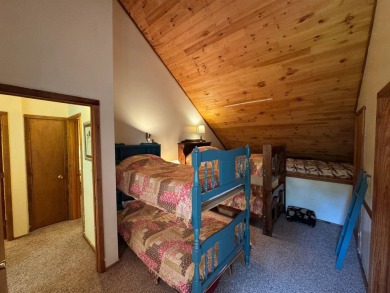 Enjoy four-season living in this inviting 2-bedroom, 1.5-bath on Hermitage Club Golf Course in Vermont - for sale on GolfHomes.com, golf home, golf lot