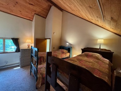Enjoy four-season living in this inviting 2-bedroom, 1.5-bath on Hermitage Club Golf Course in Vermont - for sale on GolfHomes.com, golf home, golf lot