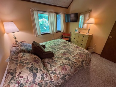 Enjoy four-season living in this inviting 2-bedroom, 1.5-bath on Hermitage Club Golf Course in Vermont - for sale on GolfHomes.com, golf home, golf lot