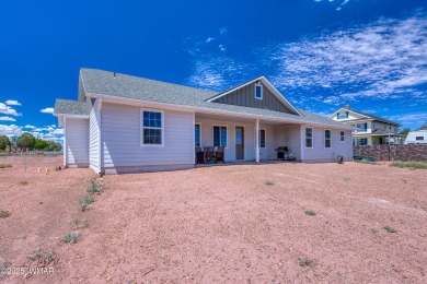 Welcome to this beautifully cared-for 4-bedroom, 2-bathroom home on Snowflake Municipal Golf Course in Arizona - for sale on GolfHomes.com, golf home, golf lot