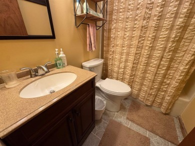 Enjoy four-season living in this inviting 2-bedroom, 1.5-bath on Hermitage Club Golf Course in Vermont - for sale on GolfHomes.com, golf home, golf lot