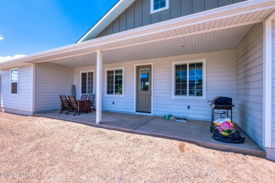 Welcome to this beautifully cared-for 4-bedroom, 2-bathroom home on Snowflake Municipal Golf Course in Arizona - for sale on GolfHomes.com, golf home, golf lot