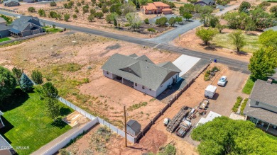Welcome to this beautifully cared-for 4-bedroom, 2-bathroom home on Snowflake Municipal Golf Course in Arizona - for sale on GolfHomes.com, golf home, golf lot