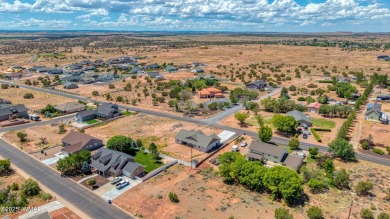 Welcome to this beautifully cared-for 4-bedroom, 2-bathroom home on Snowflake Municipal Golf Course in Arizona - for sale on GolfHomes.com, golf home, golf lot