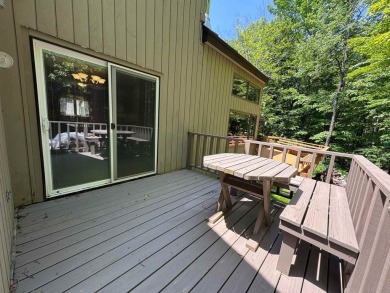 Enjoy four-season living in this inviting 2-bedroom, 1.5-bath on Hermitage Club Golf Course in Vermont - for sale on GolfHomes.com, golf home, golf lot