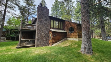 #61 Wildflower boasts an exceptional location on the 13th hole on Sunriver Woodlands Golf Course in Oregon - for sale on GolfHomes.com, golf home, golf lot