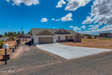 Welcome to this beautifully cared-for 4-bedroom, 2-bathroom home on Snowflake Municipal Golf Course in Arizona - for sale on GolfHomes.com, golf home, golf lot