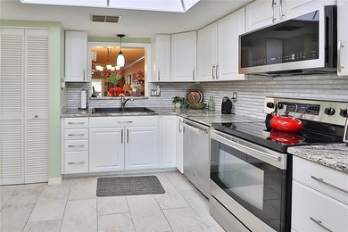 WELCOME TO THIS METICULOUS CHARMING VILLA IN HIGHLAND LAKES. 2 on Highland Lakes Executive Golf Course in Florida - for sale on GolfHomes.com, golf home, golf lot