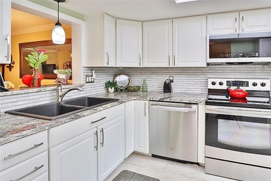 WELCOME TO THIS METICULOUS CHARMING VILLA IN HIGHLAND LAKES. 2 on Highland Lakes Executive Golf Course in Florida - for sale on GolfHomes.com, golf home, golf lot