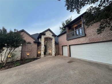 Welcome to this stunning custom-built 3-bedroom, 4-bathroom home on De Cordova Bend Country Club in Texas - for sale on GolfHomes.com, golf home, golf lot