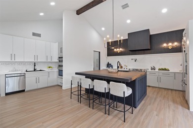 Located in Boca Grove, this charming remodel features a on Boca Grove Golf and Tennis in Florida - for sale on GolfHomes.com, golf home, golf lot