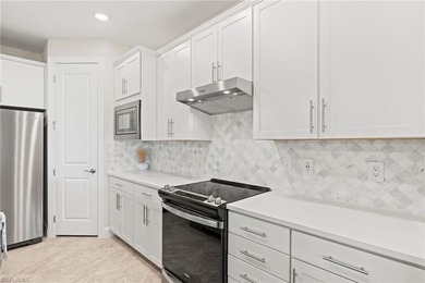 Step into this practically new luxury home in the prestigious on River Hall Country Club in Florida - for sale on GolfHomes.com, golf home, golf lot