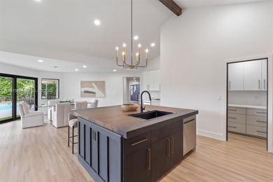 Located in Boca Grove, this charming remodel features a on Boca Grove Golf and Tennis in Florida - for sale on GolfHomes.com, golf home, golf lot