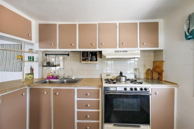 This 2-bedroom, 2-bath furnished mobile home located in the on Bay Tree Golf Course in Florida - for sale on GolfHomes.com, golf home, golf lot