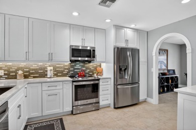 Contemporary and move in ready, recently renovated open kitchen on Boca Greens Country Club in Florida - for sale on GolfHomes.com, golf home, golf lot