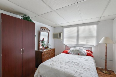 This 2-bedroom, 2-bath furnished mobile home located in the on Bay Tree Golf Course in Florida - for sale on GolfHomes.com, golf home, golf lot