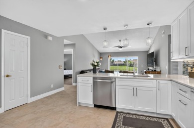 Contemporary and move in ready, recently renovated open kitchen on Boca Greens Country Club in Florida - for sale on GolfHomes.com, golf home, golf lot