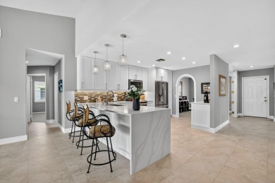 Contemporary and move in ready, recently renovated open kitchen on Boca Greens Country Club in Florida - for sale on GolfHomes.com, golf home, golf lot