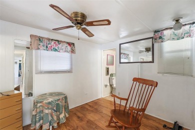 This 2-bedroom, 2-bath furnished mobile home located in the on Bay Tree Golf Course in Florida - for sale on GolfHomes.com, golf home, golf lot