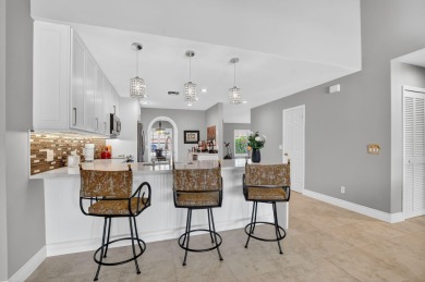 Contemporary and move in ready, recently renovated open kitchen on Boca Greens Country Club in Florida - for sale on GolfHomes.com, golf home, golf lot