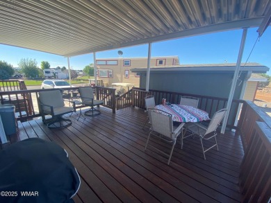 Great Location!  Enjoy the huge deck while watching the sunset on Juniper Ridge R.V. Golf Resort in Arizona - for sale on GolfHomes.com, golf home, golf lot