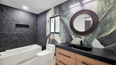 Located in Boca Grove, this charming remodel features a on Boca Grove Golf and Tennis in Florida - for sale on GolfHomes.com, golf home, golf lot