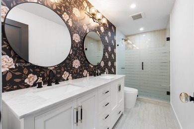 Located in Boca Grove, this charming remodel features a on Boca Grove Golf and Tennis in Florida - for sale on GolfHomes.com, golf home, golf lot