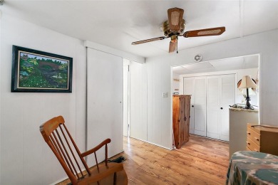This 2-bedroom, 2-bath furnished mobile home located in the on Bay Tree Golf Course in Florida - for sale on GolfHomes.com, golf home, golf lot