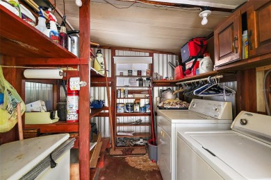 This 2-bedroom, 2-bath furnished mobile home located in the on Bay Tree Golf Course in Florida - for sale on GolfHomes.com, golf home, golf lot