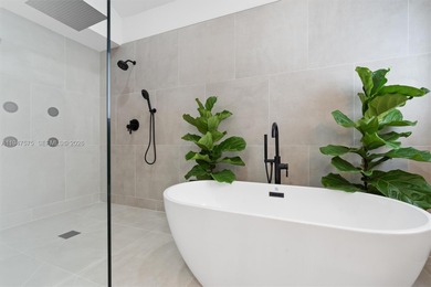 Located in Boca Grove, this charming remodel features a on Boca Grove Golf and Tennis in Florida - for sale on GolfHomes.com, golf home, golf lot