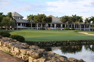 Located in Boca Grove, this charming remodel features a on Boca Grove Golf and Tennis in Florida - for sale on GolfHomes.com, golf home, golf lot