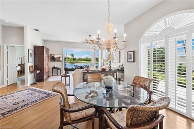 Enjoy spectacular panoramic lake and golf course views from this on Windstar on Naples Bay in Florida - for sale on GolfHomes.com, golf home, golf lot