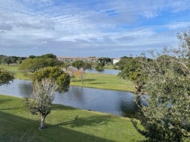 EXTRAORDINARLY BEAUTIFUL VIEW TO CANAL AND LAKE!  Completely on Flamingo Lakes Country Club in Florida - for sale on GolfHomes.com, golf home, golf lot