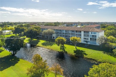 EXTRAORDINARLY BEAUTIFUL VIEW TO CANAL AND LAKE!  Completely on Flamingo Lakes Country Club in Florida - for sale on GolfHomes.com, golf home, golf lot
