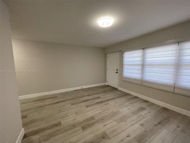 EXTRAORDINARLY BEAUTIFUL VIEW TO CANAL AND LAKE!  Completely on Flamingo Lakes Country Club in Florida - for sale on GolfHomes.com, golf home, golf lot