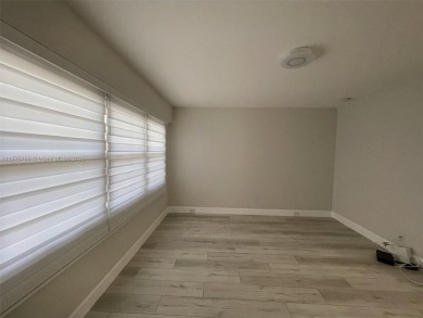 EXTRAORDINARLY BEAUTIFUL VIEW TO CANAL AND LAKE!  Completely on Flamingo Lakes Country Club in Florida - for sale on GolfHomes.com, golf home, golf lot