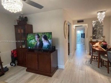 EXTRAORDINARLY BEAUTIFUL VIEW TO CANAL AND LAKE!  Completely on Flamingo Lakes Country Club in Florida - for sale on GolfHomes.com, golf home, golf lot