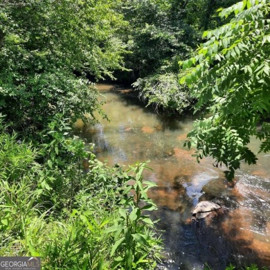 Build-Ready Estate Lot in Buckhorn - Nearly 1 Acre with Driveway on White Path Golf Club in Georgia - for sale on GolfHomes.com, golf home, golf lot