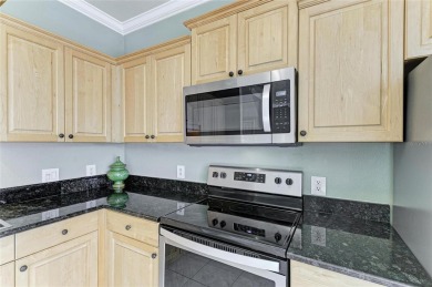 Discover the charm and convenience of this delightful two-story on University Park Country Club in Florida - for sale on GolfHomes.com, golf home, golf lot