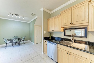 Discover the charm and convenience of this delightful two-story on University Park Country Club in Florida - for sale on GolfHomes.com, golf home, golf lot