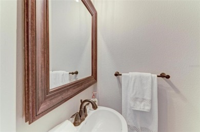 Discover the charm and convenience of this delightful two-story on University Park Country Club in Florida - for sale on GolfHomes.com, golf home, golf lot
