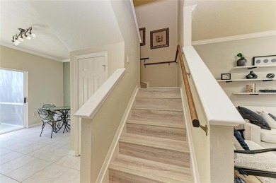 Discover the charm and convenience of this delightful two-story on University Park Country Club in Florida - for sale on GolfHomes.com, golf home, golf lot