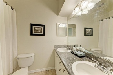 Discover the charm and convenience of this delightful two-story on University Park Country Club in Florida - for sale on GolfHomes.com, golf home, golf lot