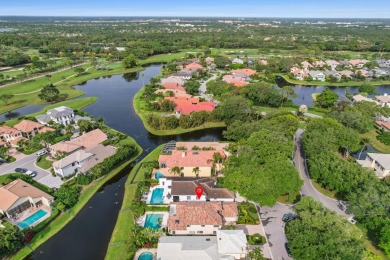 Lovely lakefront four bedroom plus den/office Patio C home with on Frenchmans Creek Country Club in Florida - for sale on GolfHomes.com, golf home, golf lot